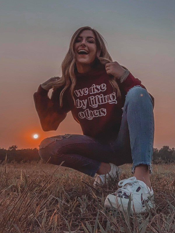 Ask Apparel We Rise By Lifting Others Sweatshirt